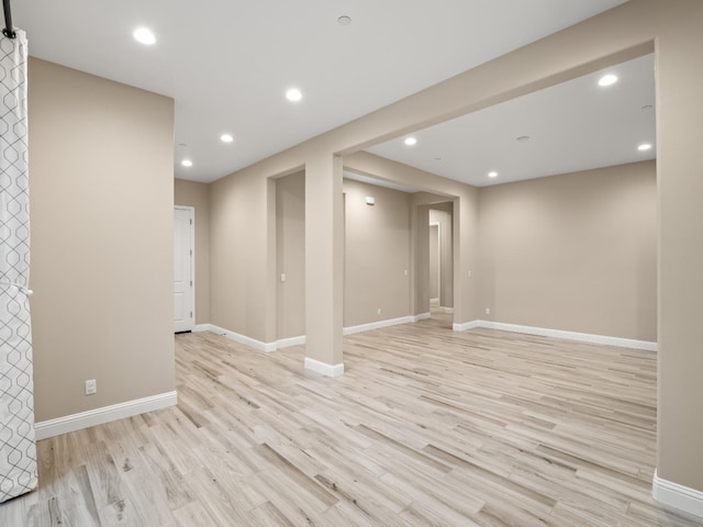 basement featuring light wood-type flooring