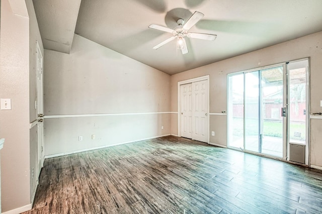 spare room with ceiling fan and hardwood / wood-style flooring