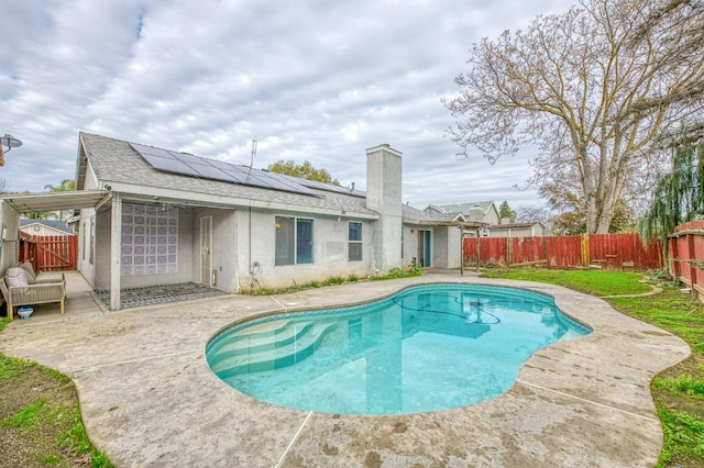 view of pool featuring a patio