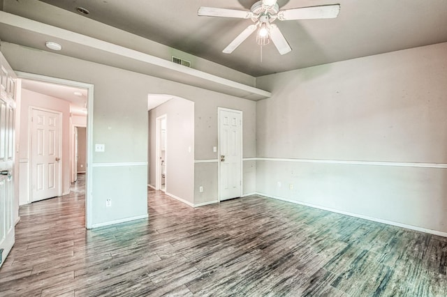 unfurnished room featuring hardwood / wood-style floors and ceiling fan