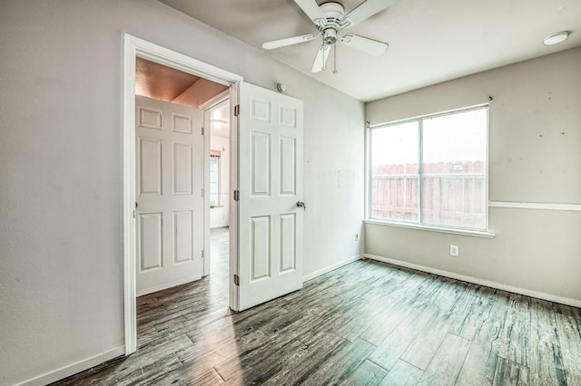 interior space with hardwood / wood-style flooring and ceiling fan