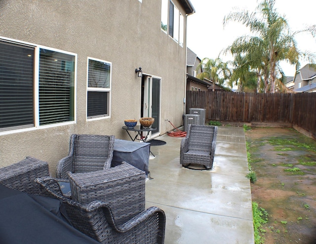 view of patio with central air condition unit