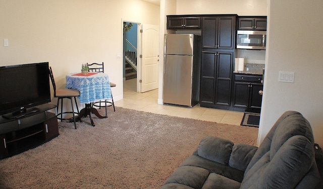 living room featuring light tile patterned floors