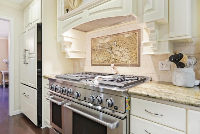 kitchen featuring decorative backsplash, dark hardwood / wood-style flooring, range with two ovens, and custom range hood