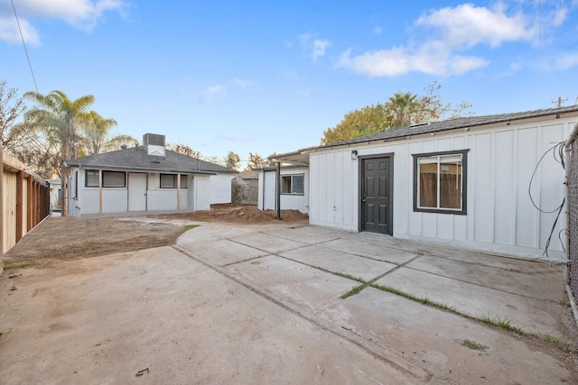 rear view of property featuring a patio