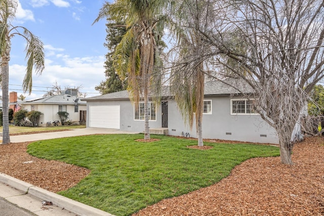 view of front facade featuring a garage and a front yard