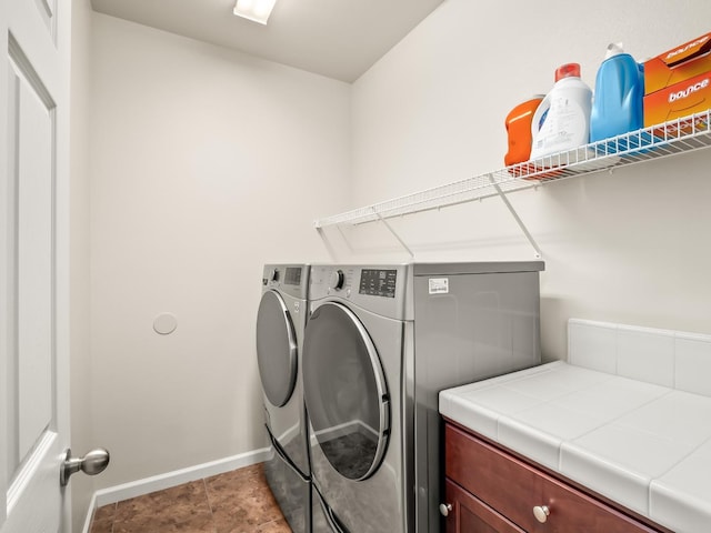 laundry area featuring separate washer and dryer