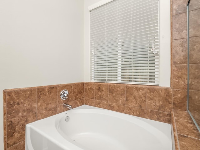 bathroom featuring a bath