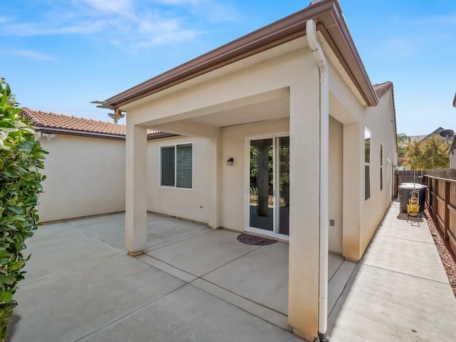 back of house featuring a patio area