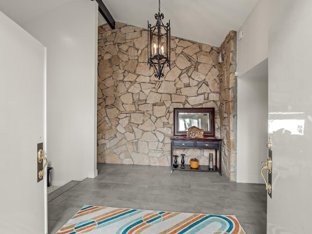 unfurnished living room with beamed ceiling and high vaulted ceiling