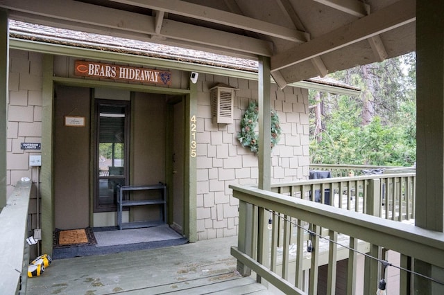 doorway to property with a balcony