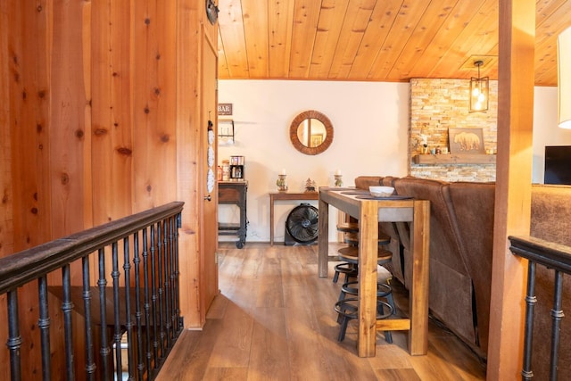 42135 Hanging Branch Rd, Shaver Lake, CA 93664 - hall with wooden ceiling, wood finished floors, and an upstairs landing