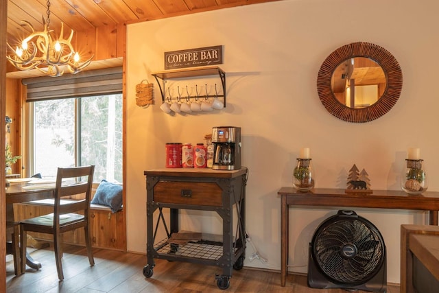 42135 Hanging Branch Rd, Shaver Lake, CA 93664 - dining space featuring a chandelier, wood finished floors, and wooden ceiling