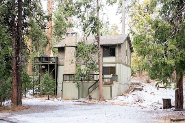 view of front of home with a deck