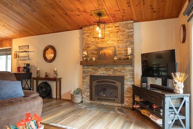42135 Hanging Branch Rd, Shaver Lake, CA 93664 - living area with wood ceiling, wood finished floors, and a fireplace