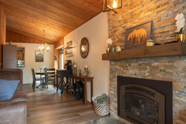 living room with a stone fireplace, wooden ceiling, vaulted ceiling, and hardwood / wood-style flooring