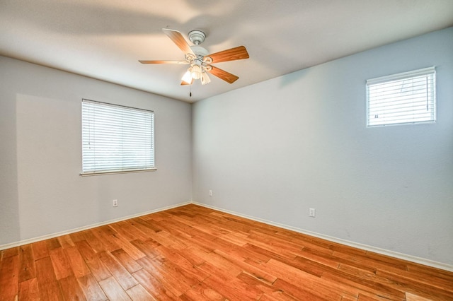 unfurnished room featuring light hardwood / wood-style flooring and ceiling fan