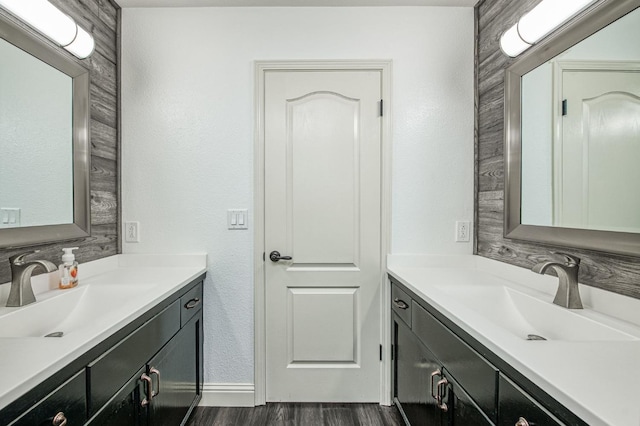 bathroom featuring vanity and hardwood / wood-style floors