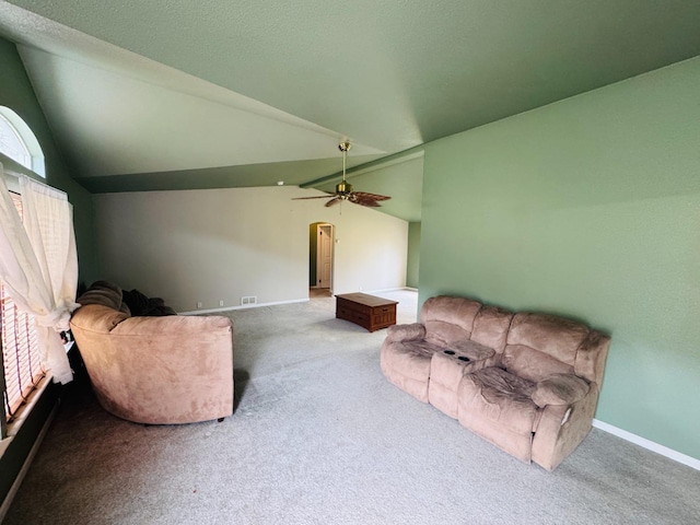 interior space with vaulted ceiling and ceiling fan