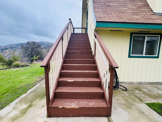 staircase featuring a mountain view