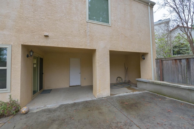 rear view of house featuring a patio area