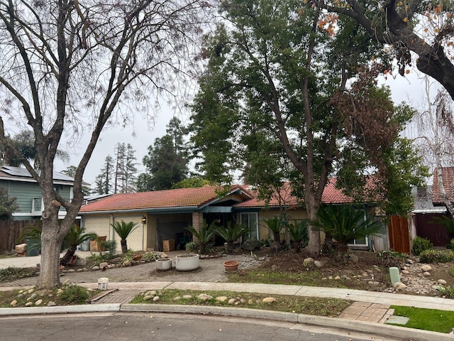 view of front of property with a garage