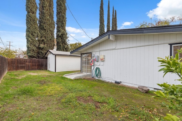 view of home's exterior with a lawn