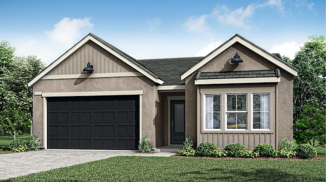 view of front facade with a front lawn and a garage