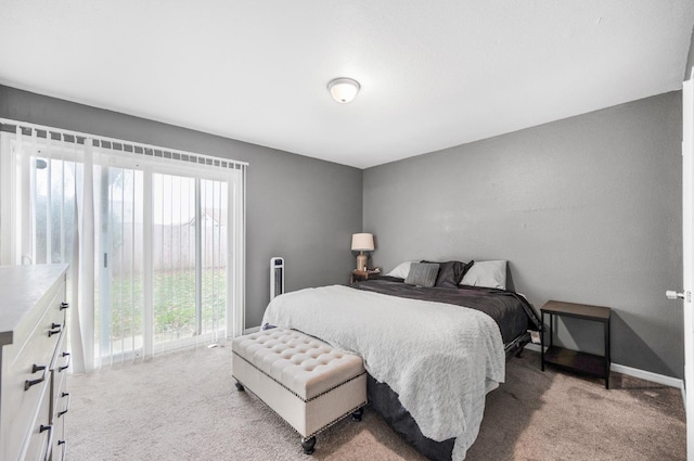 bedroom featuring light colored carpet