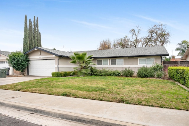 single story home with a front yard and a garage