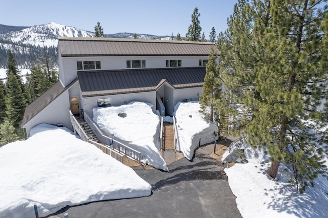 view of front of home featuring a mountain view