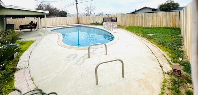 view of pool featuring a patio area