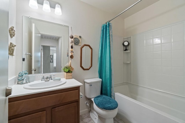 full bathroom with shower / tub combo with curtain, vanity, and toilet