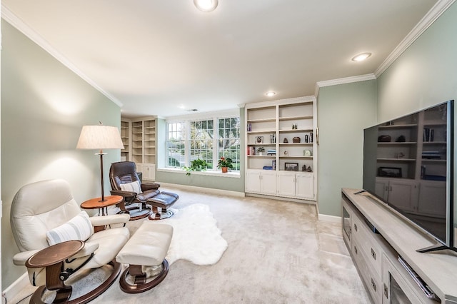 living area with ornamental molding and light carpet