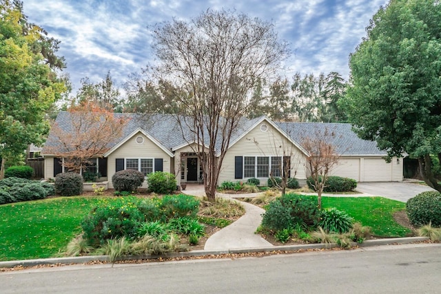 ranch-style house with a front lawn and a garage