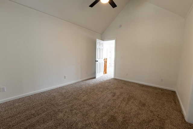 carpeted empty room with high vaulted ceiling and ceiling fan