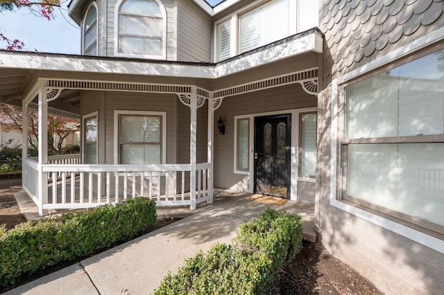 doorway to property with a porch