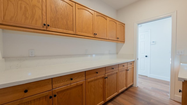 kitchen with light hardwood / wood-style flooring