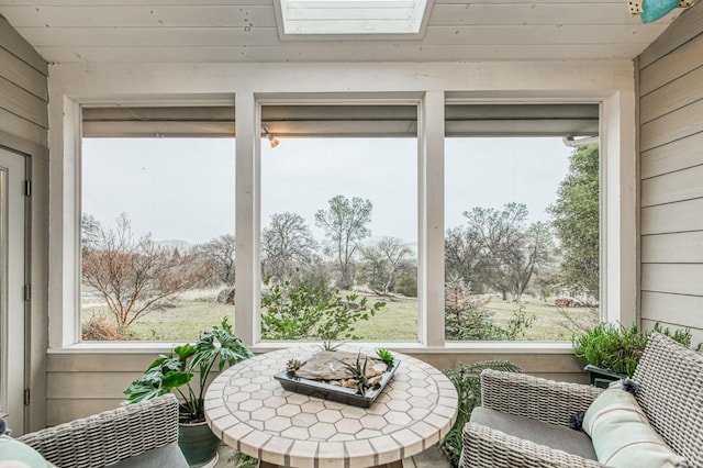 sunroom / solarium with a skylight