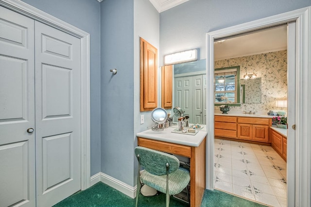 bathroom featuring tile patterned floors, vanity, and ornamental molding