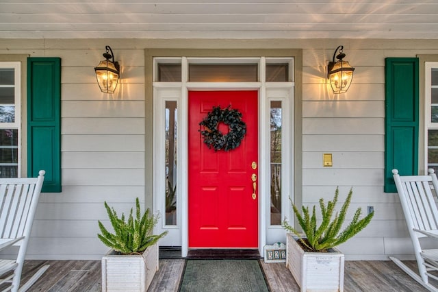 property entrance with covered porch