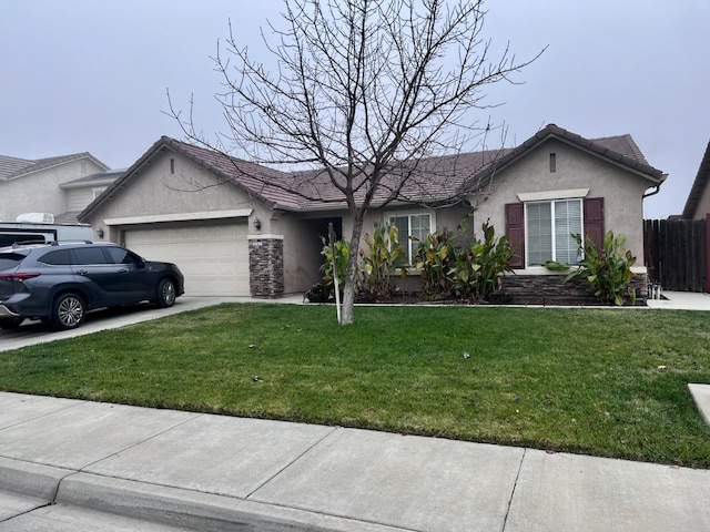 single story home with a front yard and a garage