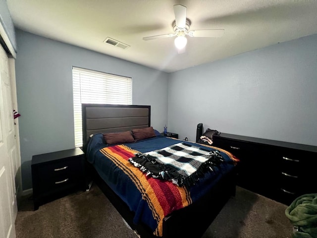 carpeted bedroom with ceiling fan