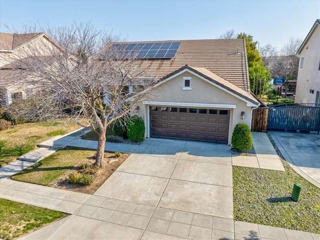 view of front of house with solar panels