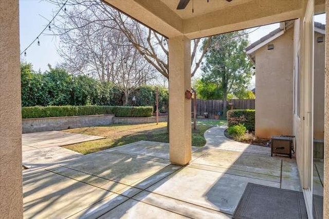 view of patio / terrace featuring ceiling fan