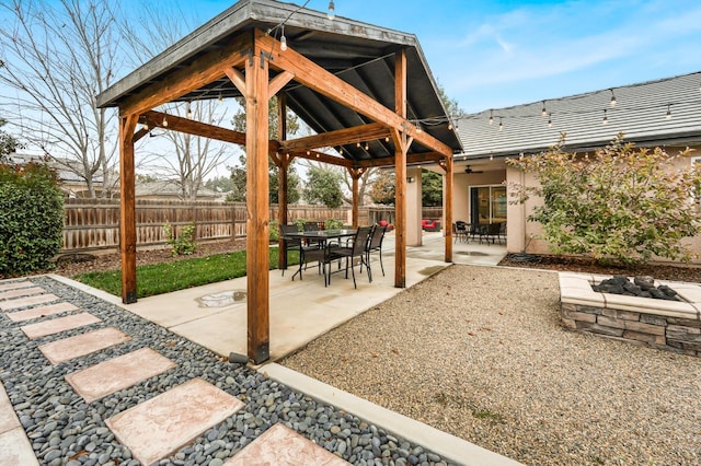 view of patio featuring a gazebo and ceiling fan