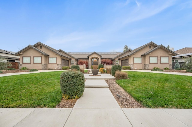 craftsman-style house with a garage and a front lawn