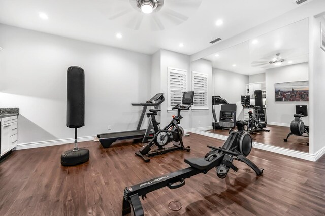 exercise room featuring hardwood / wood-style floors and ceiling fan