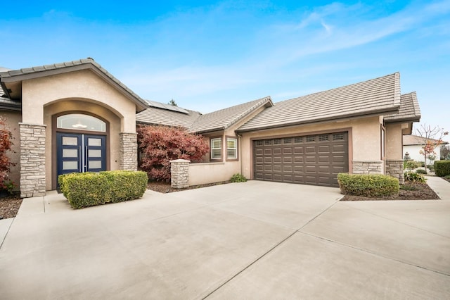 view of front of property featuring a garage