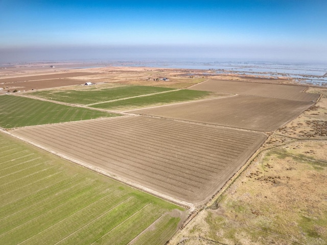 aerial view featuring a water view and a rural view